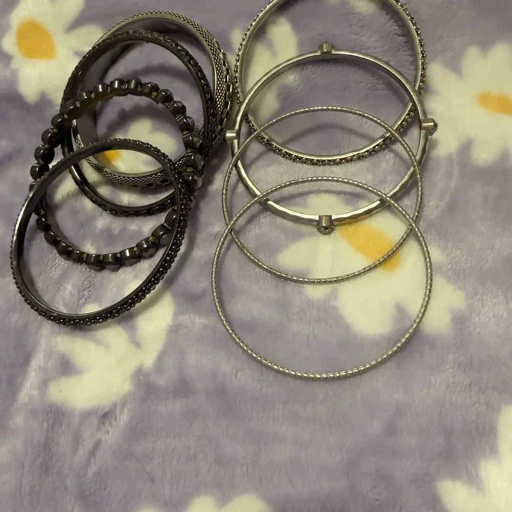 Stylish Silver and Black Bangle Set
You get all for one low price - Picture 4 of 12